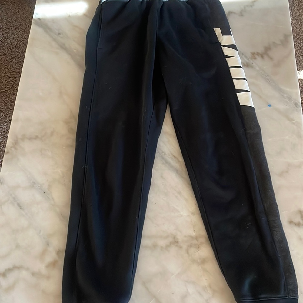 Nike- size: large, color: black and white, condition: slightly uses.